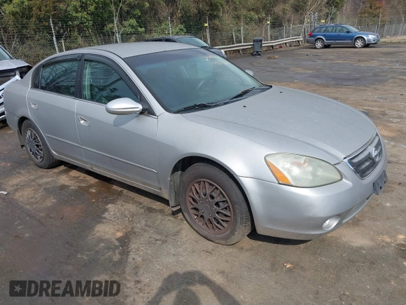 2003 Nissan Altima S with VIN 1N4AL11D23C290009, listed as a IAAI auction lot 41813061 with 247,427 mi miles. Bid and sale history available at carsss.com. Image 1.
