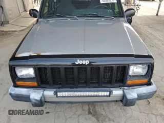 2000 Jeep Cherokee with VIN 1J4FF48S7YL221475, listed as a Copart auction lot 53005275 with 273,246 mi miles and Clean title. Bid and sale history available at DreamBid. Image 12.
