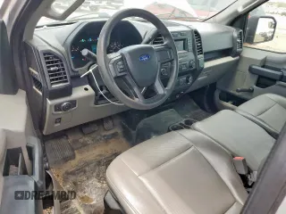 2019 Ford F-150 XL with VIN 1FTMF1CB8KKC24255, listed as a Copart auction lot 64755525 with 100,980 mi miles and Salvage title. Bid and sale history available at DreamBid. Image 8.