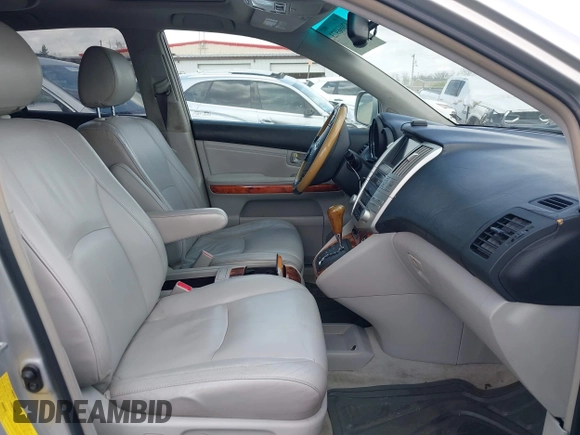 2008 Lexus RX with VIN 2T2HK31U58C053306, listed as a IAAI auction lot 42066973 with 184,266 mi miles. Bid and sale history available at carsss.com. Image 5.