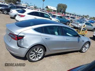 2018 Tesla Model 3 Long Range Battery with VIN 5YJ3E1EB5JF100578, listed as a IAAI auction lot 41959766 with 57,931 mi miles and . Bid and sale history available at DreamBid. Image 13.