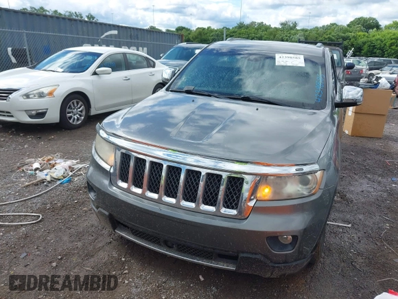 2011 Jeep Grand Cherokee Overland Summit with VIN 1J4RR6GT3BC713812, listed as a IAAI auction lot 42398585 with 208,476 mi miles and . Bid and sale history available at DreamBid. Image 6.