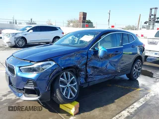 2022 BMW X2 xDrive28i z VIN WBXYJ1C02N5U85241, wystawiony jako IAAI lot #41965012 z przebiegiem 36 262 mil mil oraz . Historia ofert i sprzedaży dostępna na DreamBid. Obrazek 2.