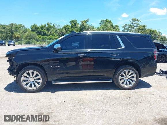 2021 Chevrolet Tahoe Premier with VIN 1GNSKSKDXMR195984, listed as a IAAI auction lot 42528305 with 89,925 mi miles and . Bid and sale history available at DreamBid. Image 15.