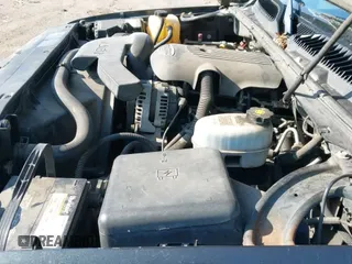 2004 GMC Yukon SLE z VIN 1GKEC13V44R269943, wystawiony jako IAAI lot #42547781 z przebiegiem 221 649 mil mil oraz . Historia ofert i sprzedaży dostępna na DreamBid. Obrazek 19.