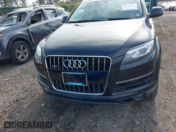 2015 Audi Q7 Premium Plus z VIN WA1LGAFE3FD021986, wystawiony jako IAAI lot #42129938 z przebiegiem 58 501 mil mil oraz . Historia ofert i sprzedaży dostępna na DreamBid. Obrazek 6.