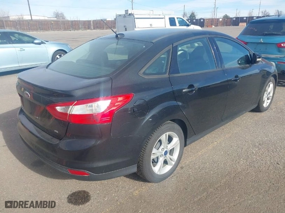 2014 Ford Focus SE with VIN 1FADP3F28EL432306, listed as a IAAI auction lot 41862236 with 136,882 mi miles. Bid and sale history available at carsss.com. Image 4.