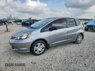 2009 Honda Fit with VIN JHMGE88269C005735, listed as a Copart auction lot 64814085 with 162,697 mi miles and Salvage title. Bid and sale history available at DreamBid. Image 1.