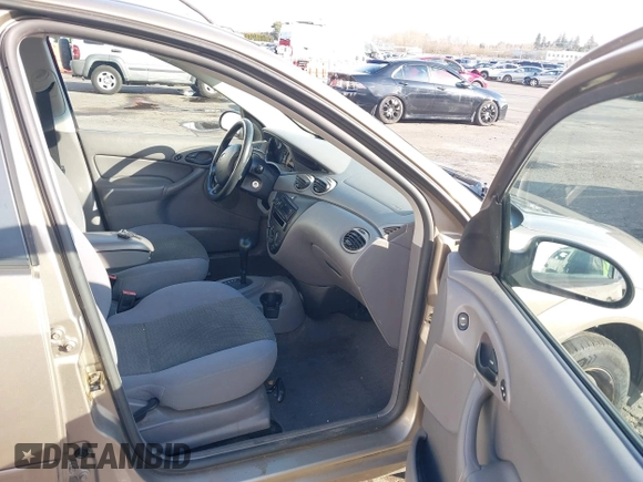 2004 Ford Focus SE with VIN 1FAFP34354W167961, listed as a IAAI auction lot 41545304 with 128,560 mi miles and . Bid and sale history available at DreamBid. Image 5.