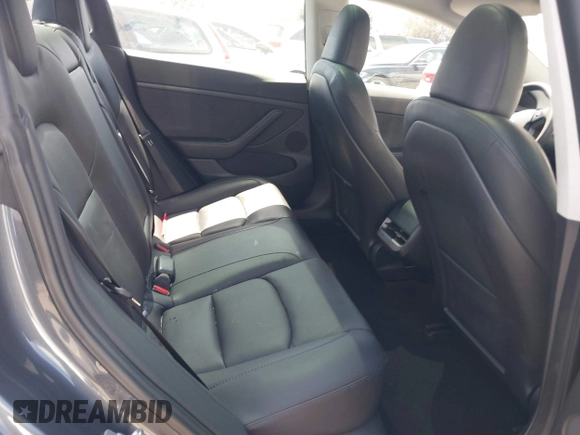 2023 Tesla Model 3 Long Range with VIN 5YJ3E1EB6PF682747, listed as a IAAI auction lot 41980506 with 32,541 mi miles and . Bid and sale history available at DreamBid. Image 8.