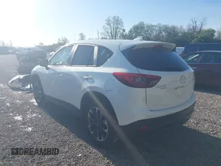 2016 Mazda CX-5 Grand Touring with VIN JM3KE4DY1G0680431, listed as a IAAI auction lot 42136637 with 166,348 mi miles. Bid and sale history available at carsss.com. Image 3.