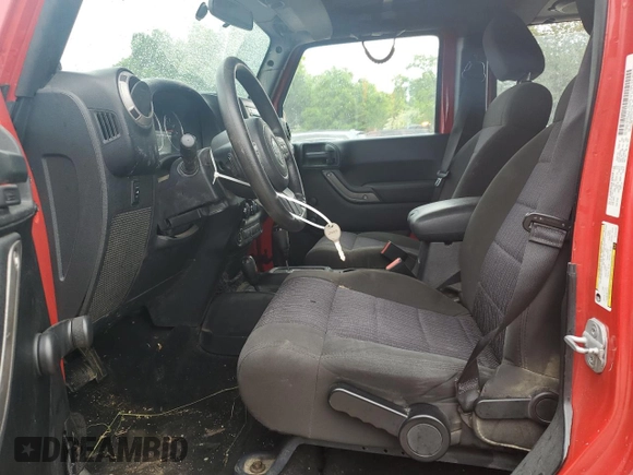 2012 Jeep Wrangler Unlimited Sport z VIN 1C4BJWDG0CL272440, wystawiony jako Copart lot #56044005 z przebiegiem 143 117 mil mil oraz Szkoda całkowita • Salvage title. Historia ofert i sprzedaży dostępna na DreamBid. Obrazek 7.