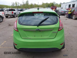 2014 Ford Fiesta Titanium z VIN 3FADP4FJ8EM165941, wystawiony jako IAAI lot #42221629 z przebiegiem 105 582 mil mil oraz . Historia ofert i sprzedaży dostępna na DreamBid. Obrazek 17.