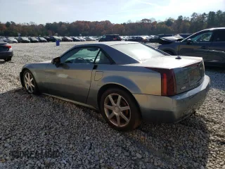 2004 Cadillac XLR z VIN 1G6YV34A845603654, wystawiony jako Copart lot #83494824 z przebiegiem 89 609 mil mil oraz Szkoda całkowita • Salvage title. Historia ofert i sprzedaży dostępna na DreamBid. Obrazek 2.