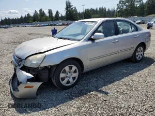 2008 Kia Optima LX z VIN KNAGE123185190108, wystawiony jako Copart lot #59364195 z przebiegiem 131 344 mil mil oraz Szkoda całkowita • Salvage title. Historia ofert i sprzedaży dostępna na DreamBid. Obrazek 1.