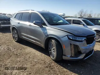 2022 Cadillac XT6 Sport with VIN 1GYKPGRS3NZ142843, listed as a Copart auction lot 47843925 with 26,668 mi miles and Salvage Title. Bid and sale history available at carsss.com. Image 4.