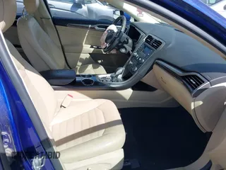 2014 Ford Fusion SE Hybrid с VIN 3FA6P0LU9ER129016, выставлен на аукционе IAAI как лот 42269103 с пробегом 170 001 миль миль и . История ставок и продаж доступна на DreamBid. Изображение 5.