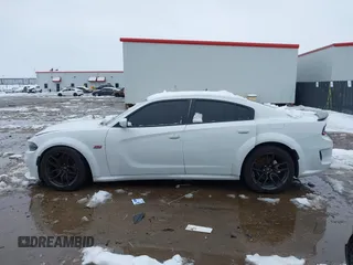 2022 Dodge Charger Scat Pack Widebody with VIN 2C3CDXGJ4NH183094, listed as a IAAI auction lot 41300119 with 31,800 mi miles and . Bid and sale history available at carsss.com. Image 15.