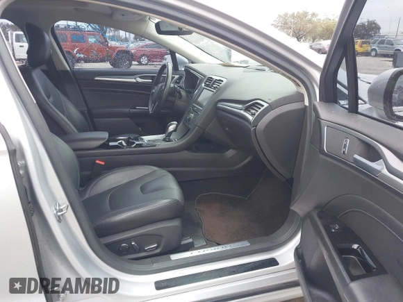 2015 Ford Fusion Titanium with VIN 3FA6P0K94FR120318, listed as a IAAI auction lot 41380325 with 137,910 mi miles. Bid and sale history available at carsss.com. Image 5.