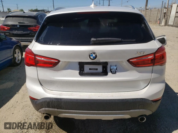 2018 BMW X1 sDrive28i with VIN WBXHU7C31J5H44190, listed as a Copart auction lot 67802544 with 96,973 mi miles and Clean Title. Bid and sale history available at carsss.com. Image 6.