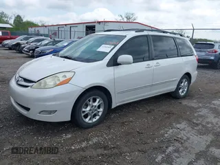 2006 Toyota Sienna XLE with VIN 5TDZA22C36S547762, listed as a IAAI auction lot 42182368 with 166,023 mi miles. Bid and sale history available at carsss.com. Image 2.