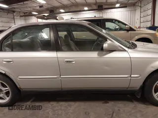 1996 Honda Civic EX with VIN 1HGEJ864XTL053613, listed as a IAAI auction lot 41717526 with 247,022 mi miles. Bid and sale history available at carsss.com. Image 14.
