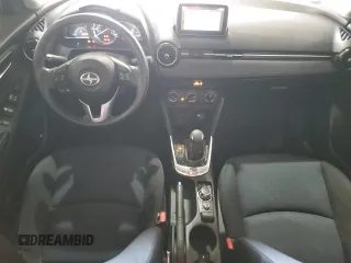2016 Scion iA z VIN 3MYDLBZV3GY126714, wystawiony jako Copart lot #53955955 z przebiegiem 79 349 mil mil oraz Szkoda całkowita • Salvage title. Historia ofert i sprzedaży dostępna na DreamBid. Obrazek 8.