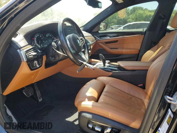 2018 BMW 5 Series M550i xDrive with VIN WBAJB9C56JB286479, listed as a Copart auction lot 57108645 with 71,782 mi miles and Salvage title. Bid and sale history available at DreamBid. Image 7.