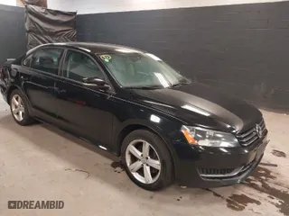 2014 Volkswagen Passat Wolfsburg Ed with VIN 1VWAT7A37EC032878, listed as a IAAI auction lot 41274193 with 164,792 mi miles. Bid and sale history available at carsss.com. Image 1.