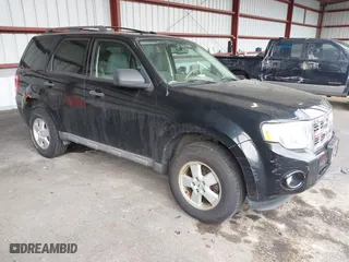 2009 Ford Escape XLT with VIN 1FMCU93G79KC30405, listed as a IAAI auction lot 42043034 with 136,086 mi miles. Bid and sale history available at carsss.com. Image 1.