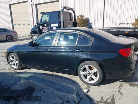 2015 BMW 3 Series 328i with VIN WBA3C1C53FK120984, listed as a IAAI auction lot 41338035 with 119,486 mi miles and . Bid and sale history available at carsss.com. Image 14.