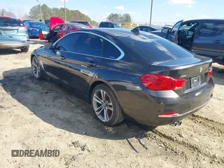 2018 BMW 4 Series 430i xDrive with VIN WBA4J3C54JBG95242, listed as a IAAI auction lot 41180565 with 83,710 mi miles and . Bid and sale history available at DreamBid. Image 3.