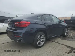 2018 BMW X6 xDrive35i z VIN 5UXKU2C52J0X49351, wystawiony jako Copart lot #55630745 z przebiegiem 139 605 mil mil oraz Tytuł czysty. Historia ofert i sprzedaży dostępna na DreamBid. Obrazek 3.