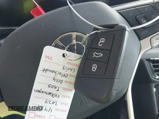 2024 Volkswagen Taos S z VIN 3VV5X7B24RM123644, wystawiony jako IAAI lot #42247698 z przebiegiem 8 097 mil mil oraz . Historia ofert i sprzedaży dostępna na DreamBid. Obrazek 11.