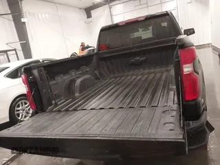 2021 Chevrolet Silverado 1500 RST with VIN 1GCRYEEDXMZ135111, listed as a IAAI auction lot 41398152 with 54,051 mi miles and . Bid and sale history available at DreamBid. Image 18.