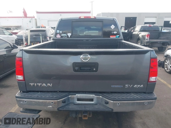 2014 Nissan Titan Pro-4X with VIN 1N6BA0EC3EN514358, listed as a IAAI auction lot 41636363 with 166,201 mi miles and . Bid and sale history available at DreamBid. Image 16.