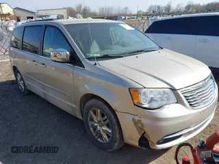 2012 Chrysler Town & Country Touring-L with VIN 2C4RC1CG0CR340692, listed as a IAAI auction lot 42112578 with 200,681 mi miles. Bid and sale history available at carsss.com. Image 1.