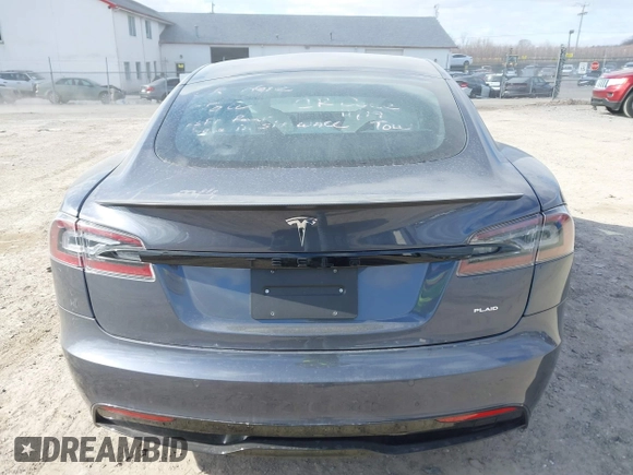 2021 Tesla Model S Plaid with VIN 5YJSA1E60MF455768, listed as a IAAI auction lot 41603504 with 27,398 mi miles. Bid and sale history available at carsss.com. Image 16.