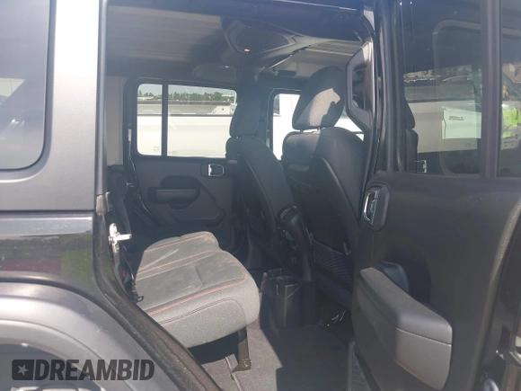 2024 Jeep Wrangler Rubicon with VIN 1C4PJXFG0RW271322, listed as a IAAI auction lot 42736647 with 32,319 mi miles and . Bid and sale history available at DreamBid. Image 8.