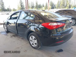 2015 Kia Forte LX with VIN KNAFK4A60F5290540, listed as a IAAI auction lot 42046059 with 107,232 mi miles. Bid and sale history available at carsss.com. Image 3.