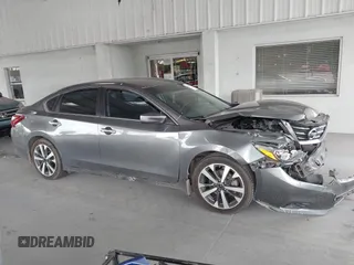 2017 Nissan Altima SL z VIN 1N4AL3AP7HC492566, wystawiony jako IAAI lot #42193702 z przebiegiem 165 566 mil mil oraz . Historia ofert i sprzedaży dostępna na DreamBid. Obrazek 13.