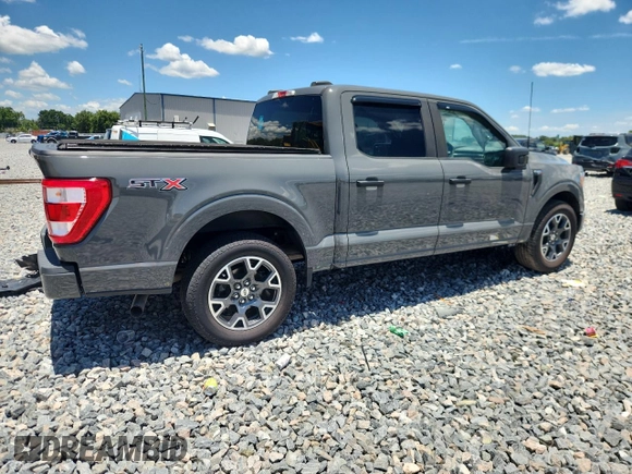 2021 Ford F-150 XL with VIN 1FTEW1CP1MFB85228, listed as a Copart auction lot 61338555 with Not provided miles and Salvage title. Bid and sale history available at DreamBid. Image 3.