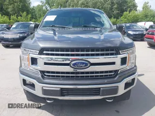 2018 Ford F-150 XL with VIN 1FTEW1E57JFA95086, listed as a IAAI auction lot 42574704 with 77,301 mi miles and . Bid and sale history available at DreamBid. Image 12.