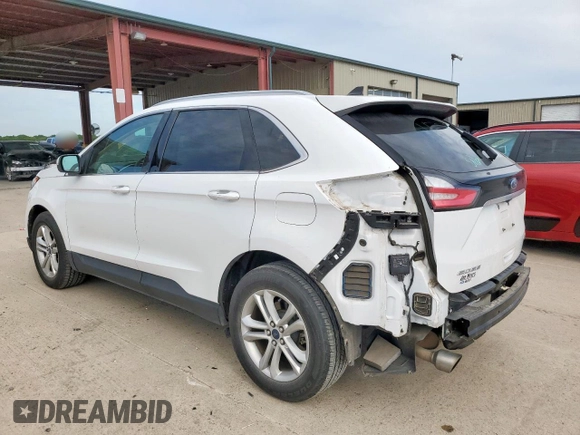 2020 Ford Edge SEL с VIN 2FMPK3J93LBB16928, выставлен на аукционе Copart как лот 63030385 с пробегом 81 567 миль миль и Чистый • Clean title. История ставок и продаж доступна на DreamBid. Изображение 2.