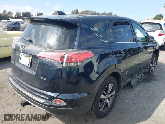 2017 Toyota RAV4 XLE with VIN JTMWFREV3HD105878, listed as a IAAI auction lot 41889338 with 75,784 mi miles. Bid and sale history available at carsss.com. Image 4.