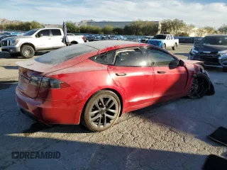 2021 Tesla Model S Plaid z VIN 5YJSA1E65MF435922, wystawiony jako Copart lot #77417854 z przebiegiem Nie podano mil oraz Szkoda całkowita • Salvage title. Historia ofert i sprzedaży dostępna na DreamBid. Obrazek 3.