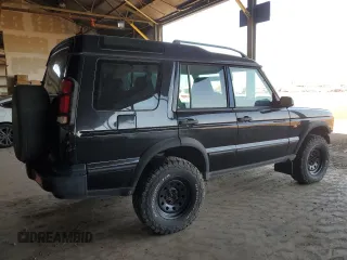 2001 Land Rover Discovery Cloth with VIN SALTY15491A294591, listed as a Copart auction lot 46454845 with 180,914 mi miles and Salvage Title. Bid and sale history available at DreamBid. Image 3.