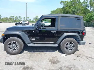 2019 Jeep Wrangler Sport S with VIN 1C4GJXAG2KW664395, listed as a IAAI auction lot 42683888 with 72,742 mi miles and . Bid and sale history available at DreamBid. Image 14.