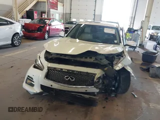 2015 Infiniti Q50 Premium with VIN JN1BV7APXFM353042, listed as a IAAI auction lot 42327460 with 108,497 mi miles and . Bid and sale history available at DreamBid. Image 13.