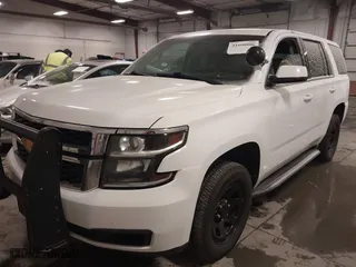 2018 Chevrolet Tahoe Commercial with VIN 1GNSKDEC1JR240868, listed as a IAAI auction lot 41608806 with 138,126 mi miles. Bid and sale history available at carsss.com. Image 2.